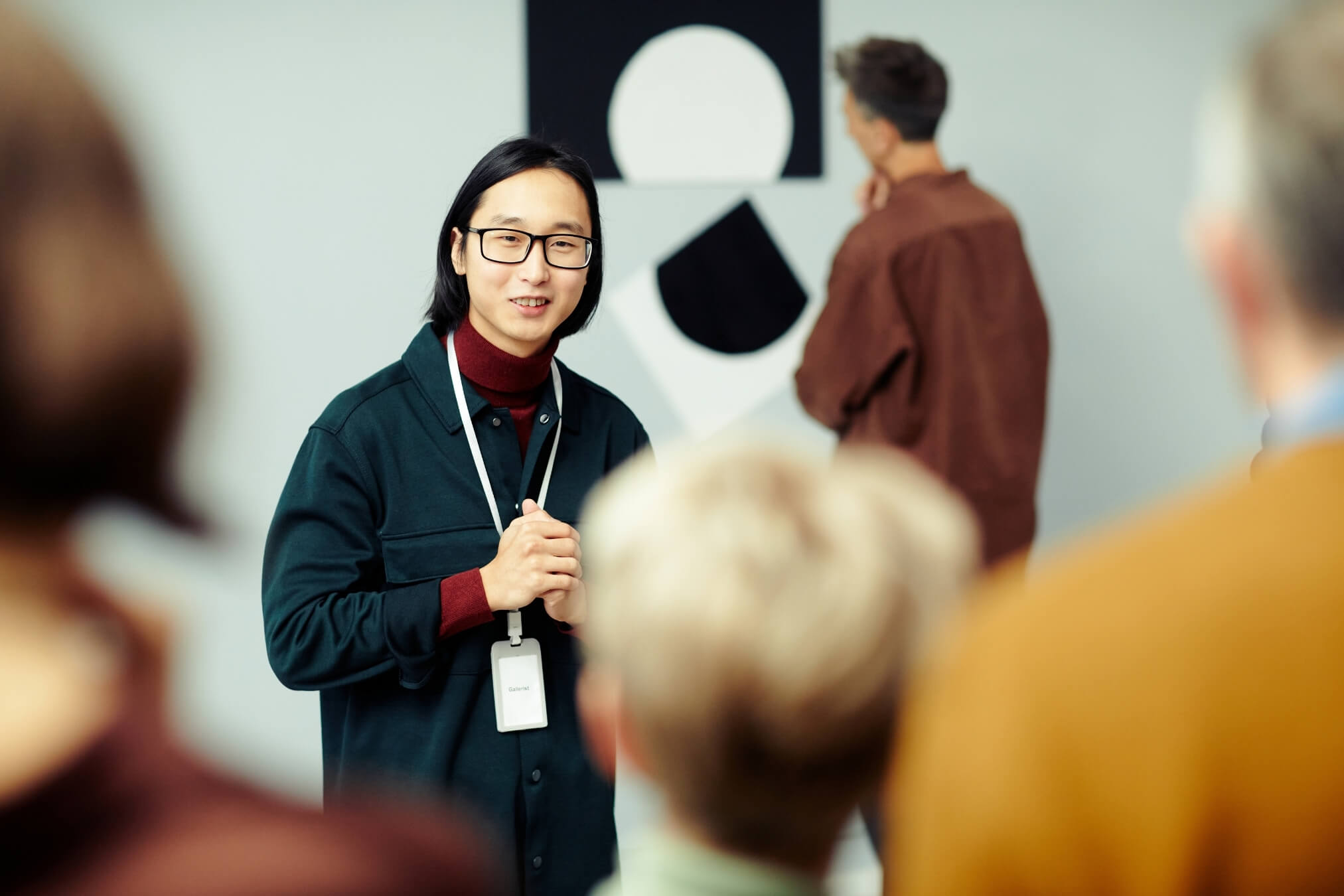 museum employee providing a guided tour