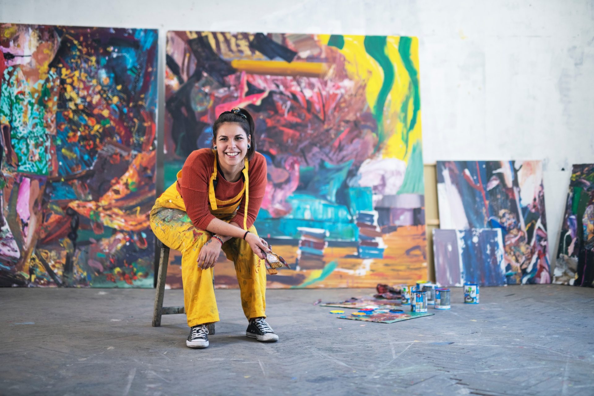 artist in her studio posing.