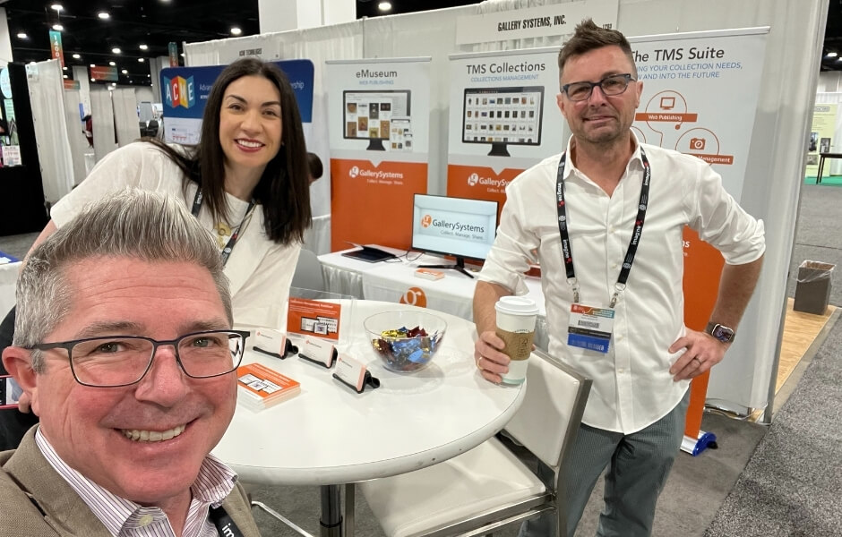Chris Alexander with colleagues Lauren McLean and Robb Detlefs at the Gallery Systems trade show booth