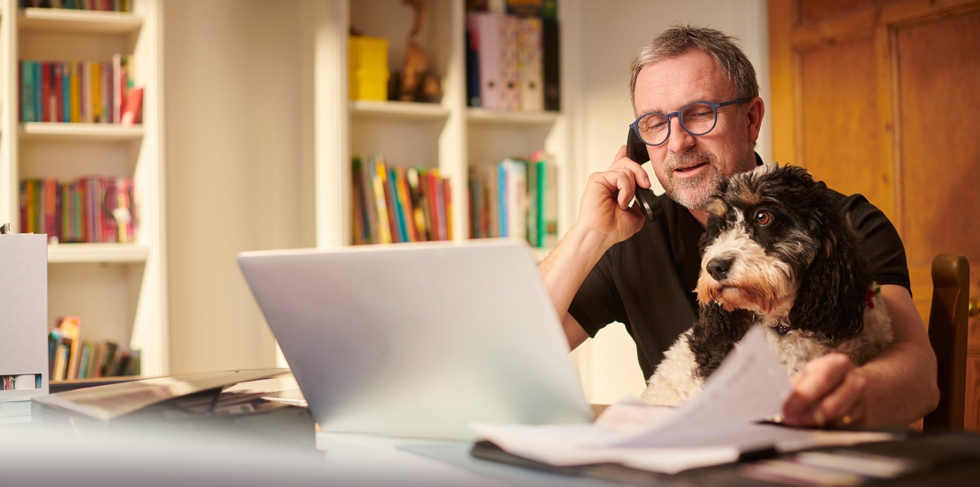 art collector reviewing his art assets.