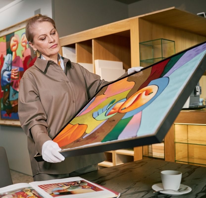 registrar reviewing artwork