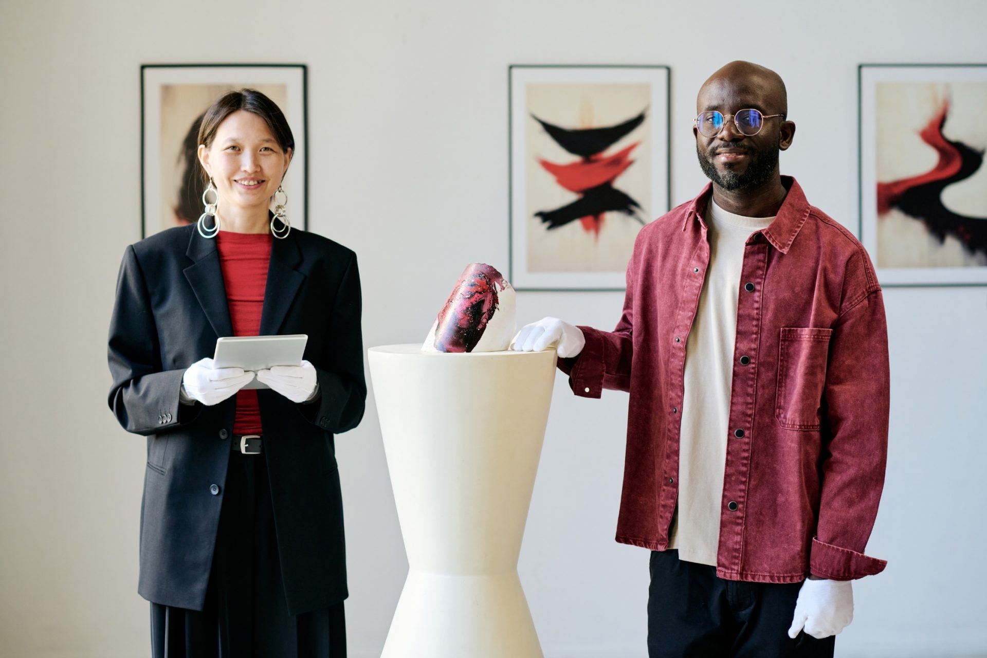 registrars working in an exhibition install.