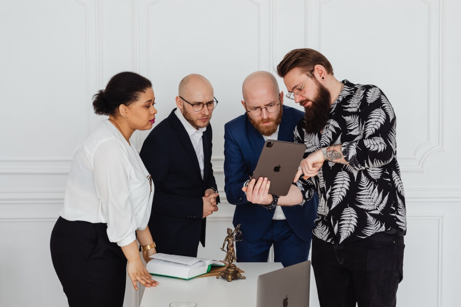 Gallery team reviewing information on a tablet