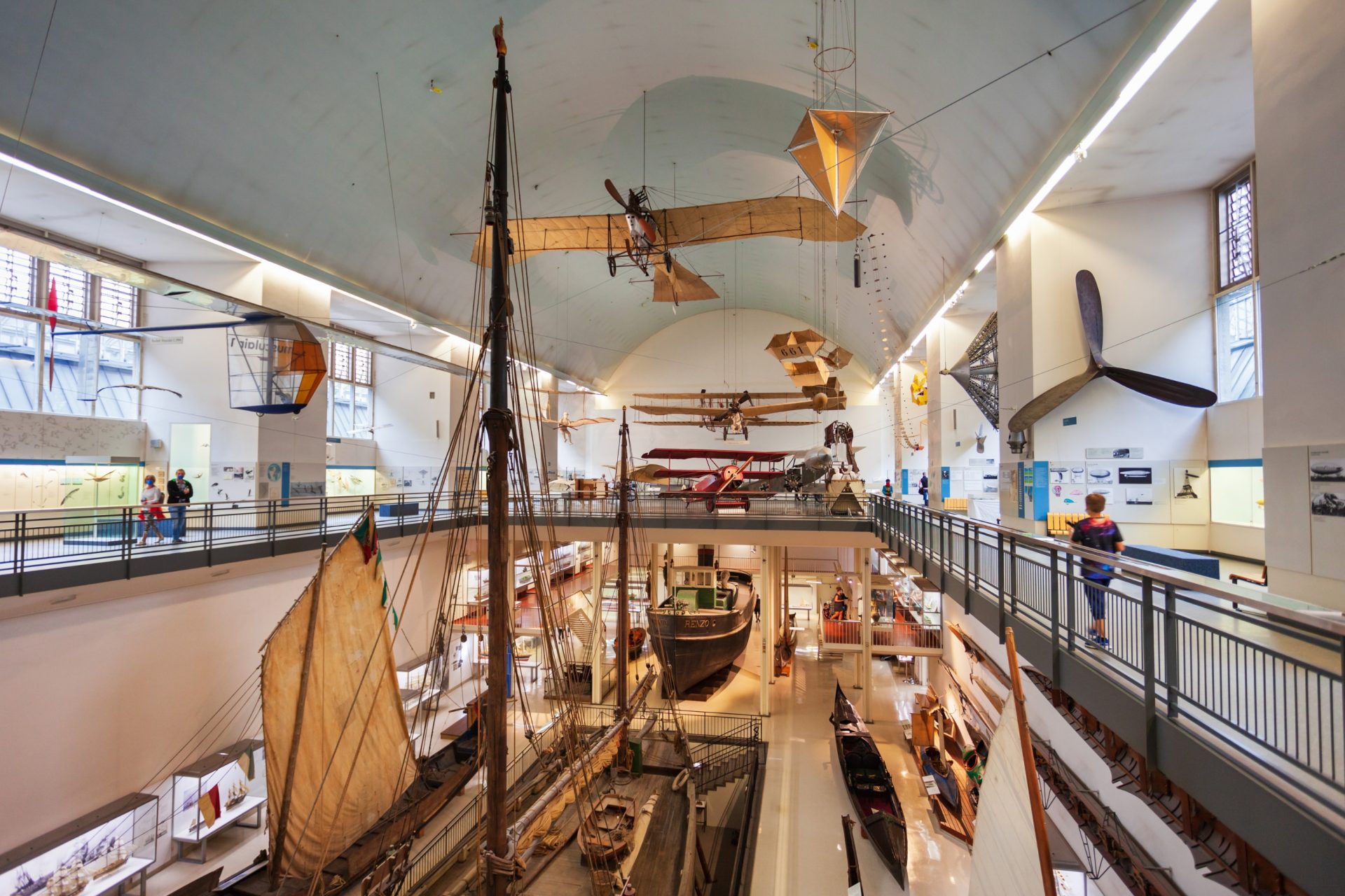 museum exhibition with military planes and boats