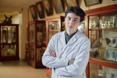 museum staff member working in an exhibition space